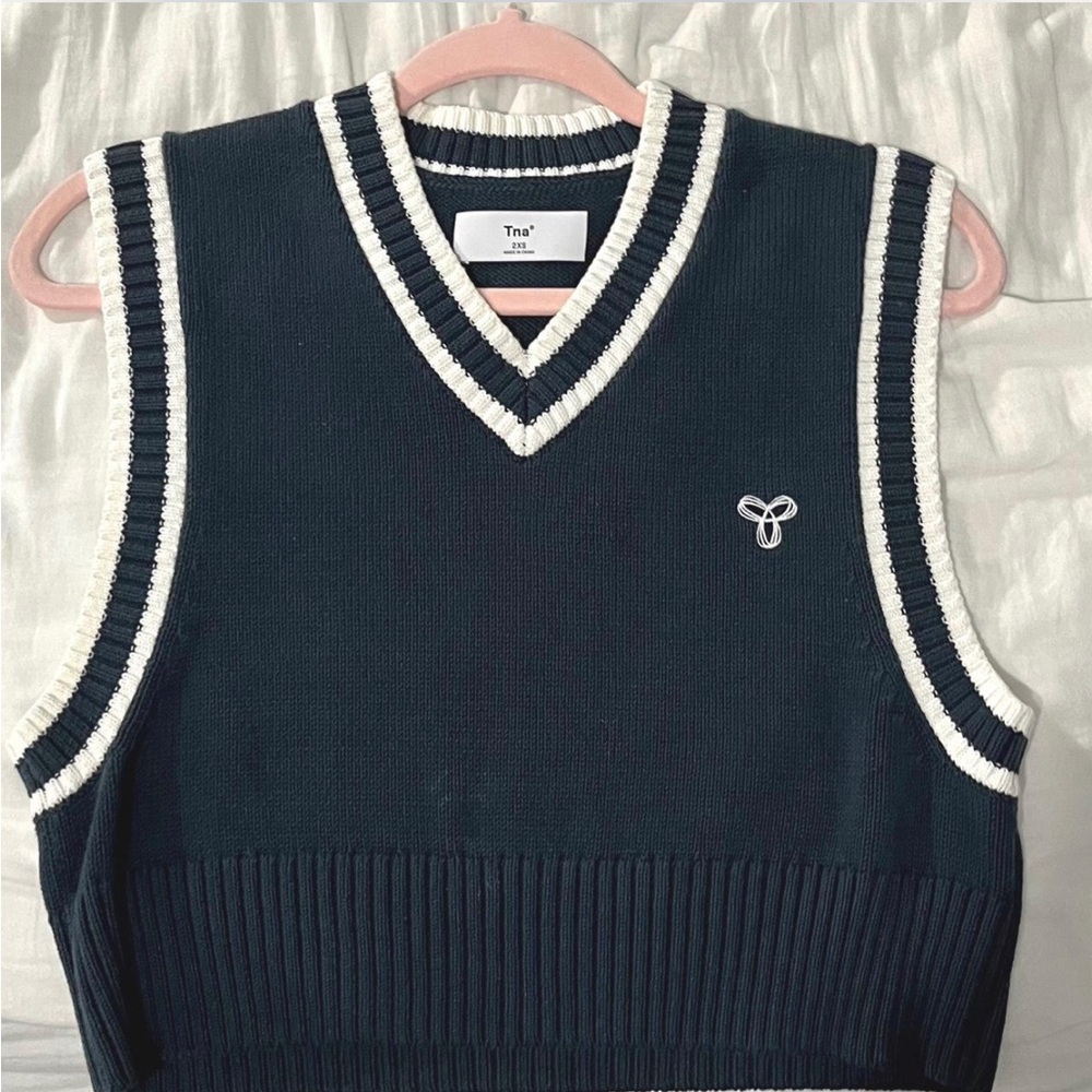 Aritzia Tna woven cropped sweater vest in navy and white.
